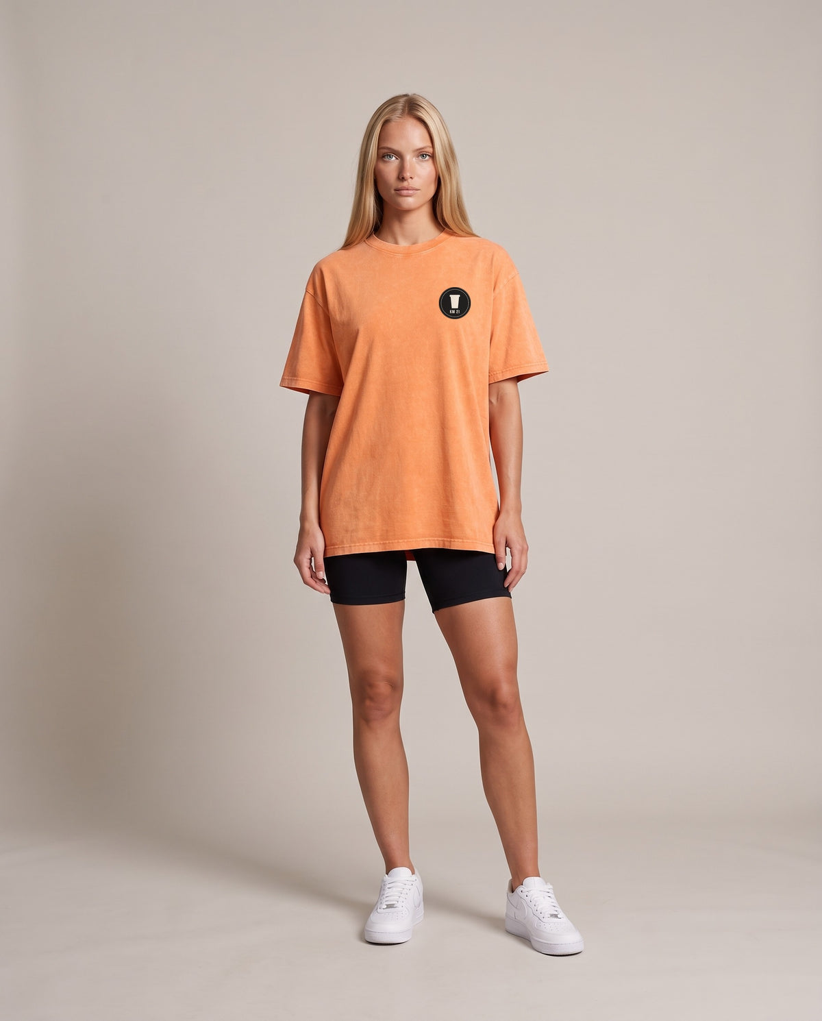 Aid Station Oversized Tee — Orange & Water Blue, front, worn by an ENDUR model