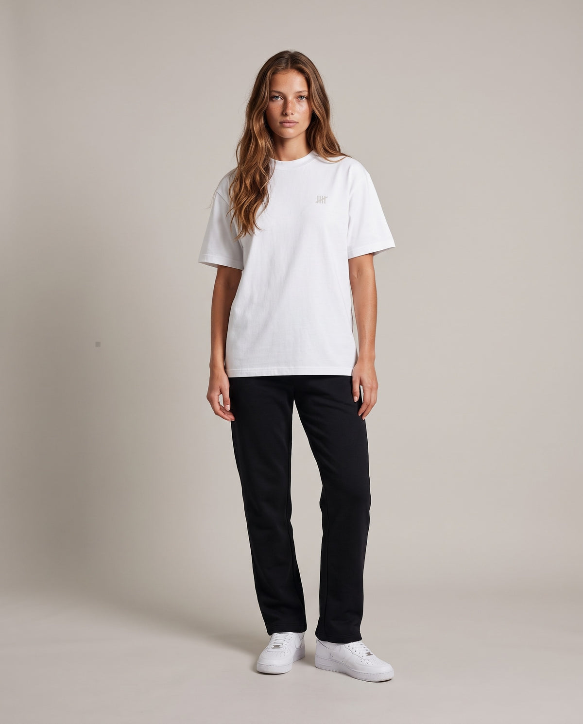 Reason Tee DR-01 — White, front, worn by an ENDUR model