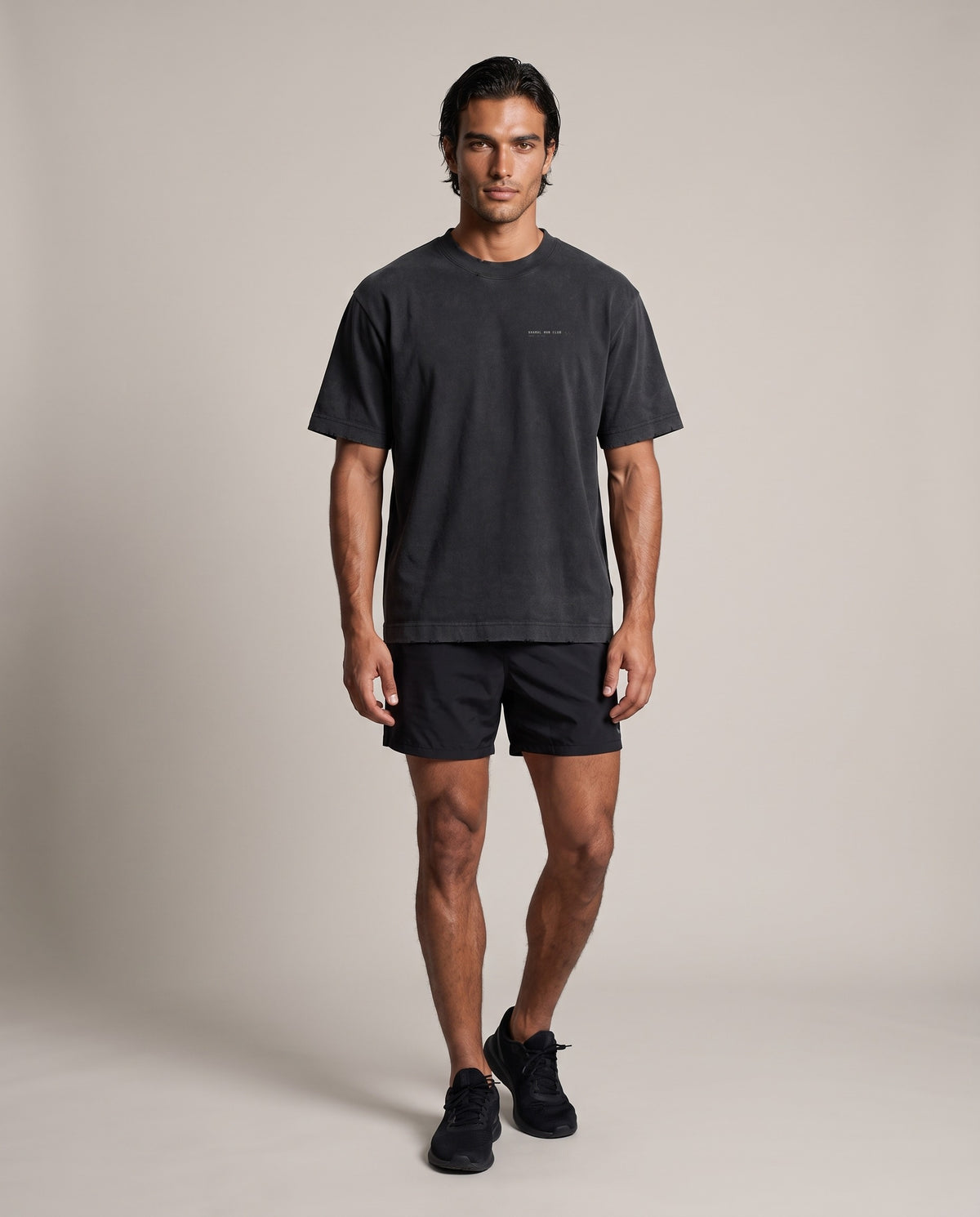 Shamal Heavyweight Tee — Black & Gray Coffee, front, worn by an ENDUR model
