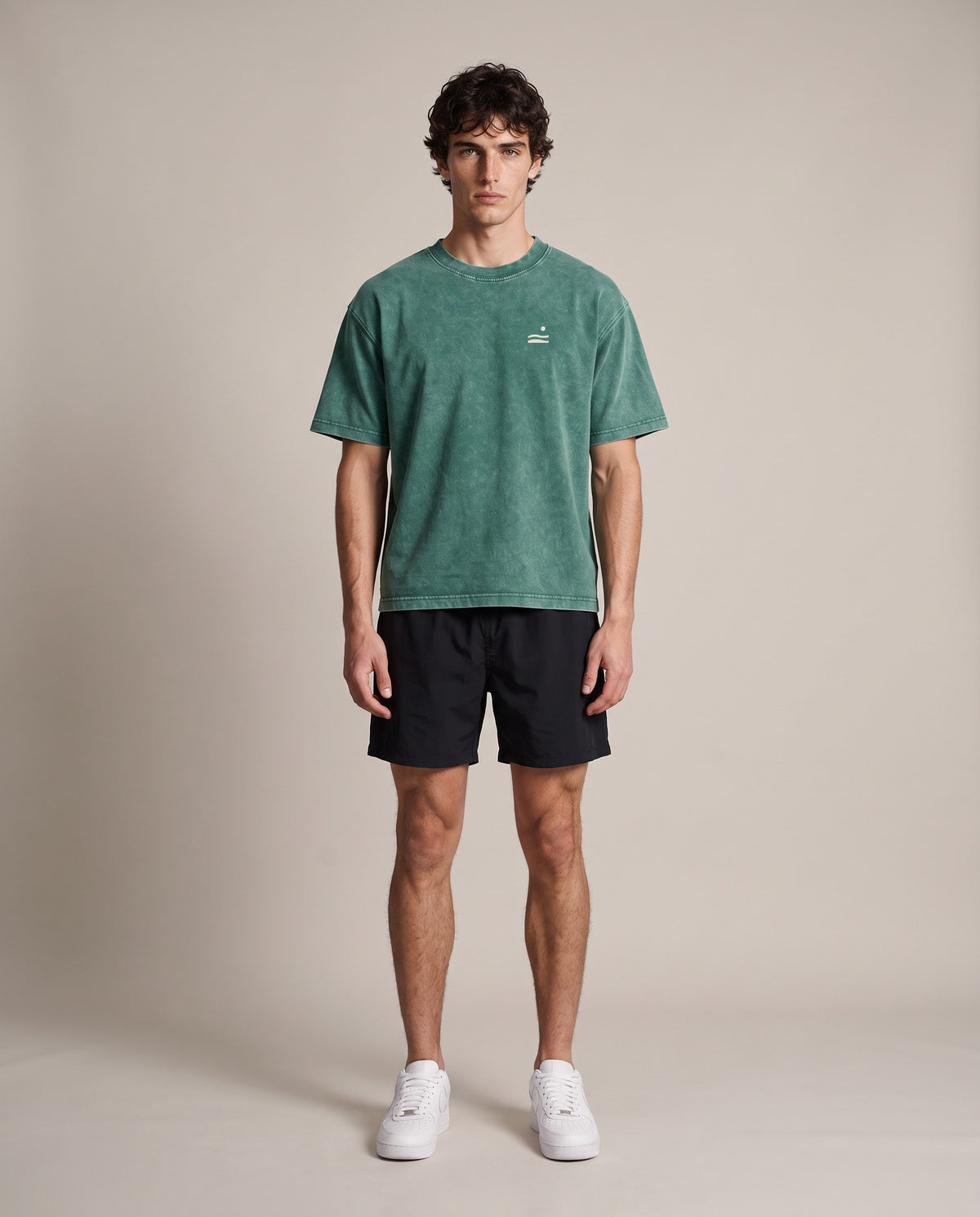 Slow Is A Pace Tee — Blackish Green, front, worn by an ENDUR model