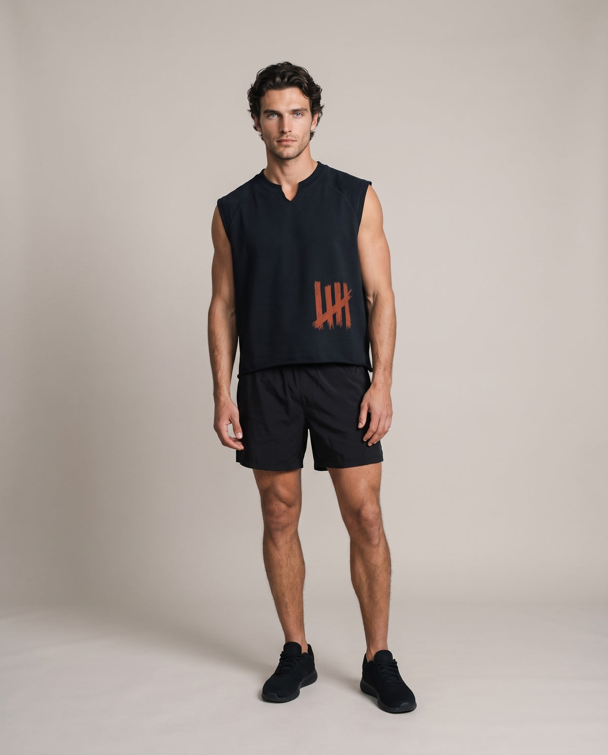 The Mark Boxy Tank — Black, front, worn by an ENDUR model