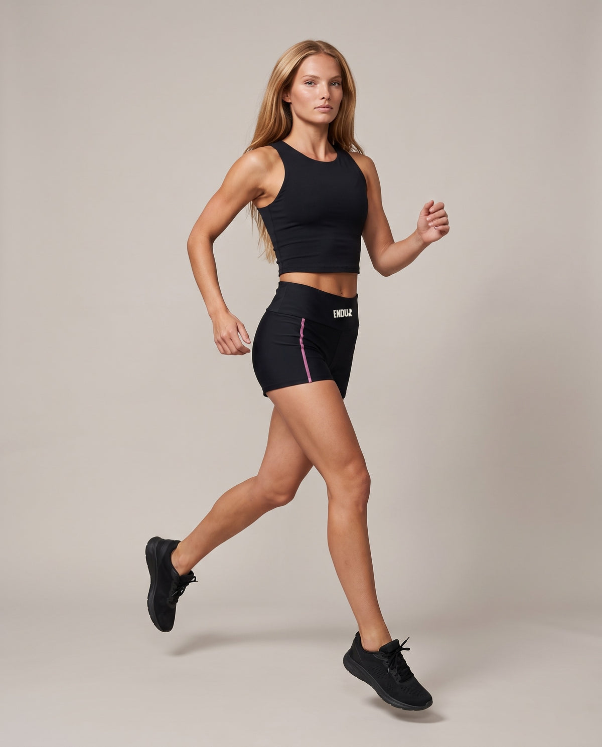 Off Day Fold-Over Shorts (Women's), in motion, worn by an ENDUR model