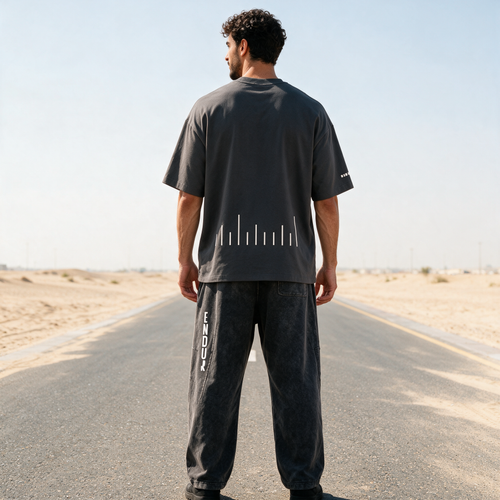 Model wearing the ENDUR Boxy Tee, back view