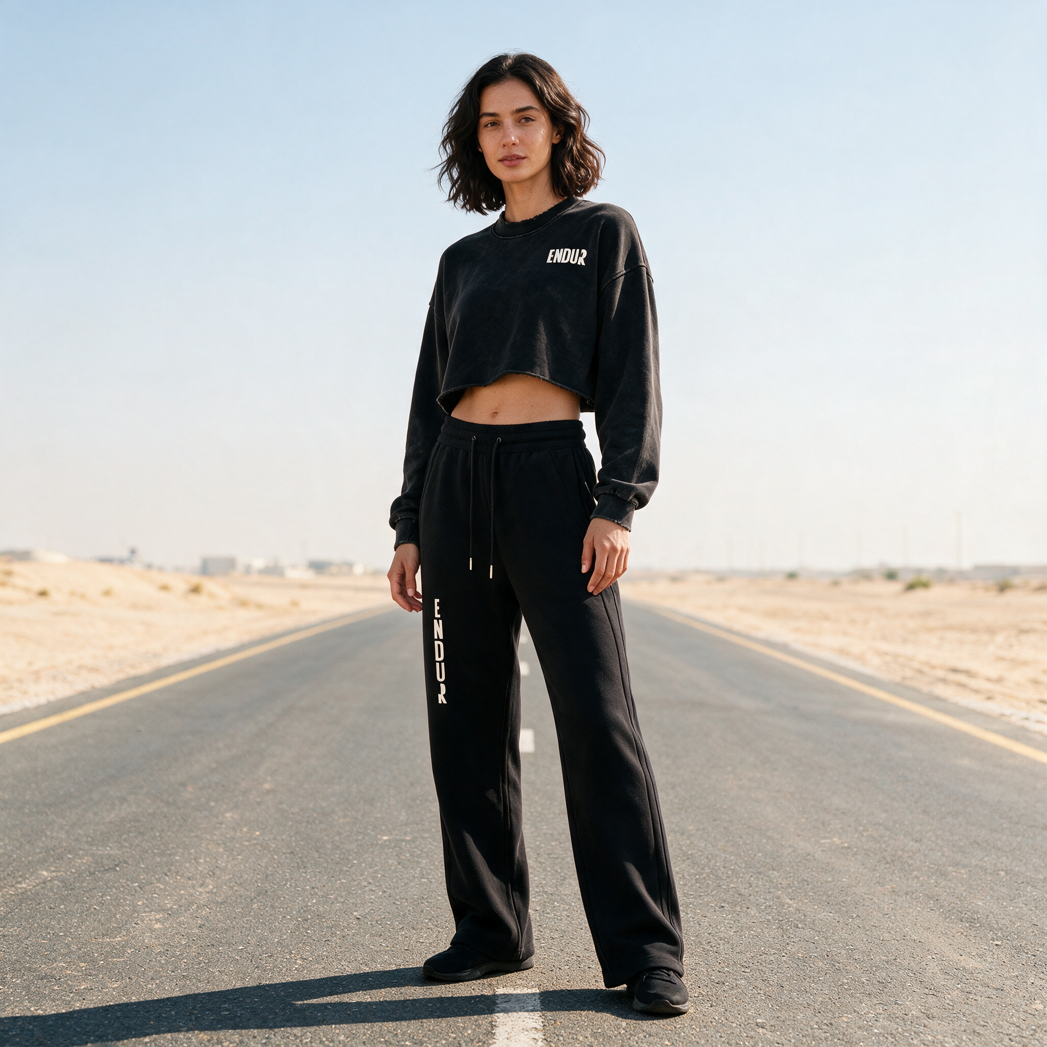 Model wearing the ENDUR Drawstring Straight-Leg Sweatpants, three quarter view