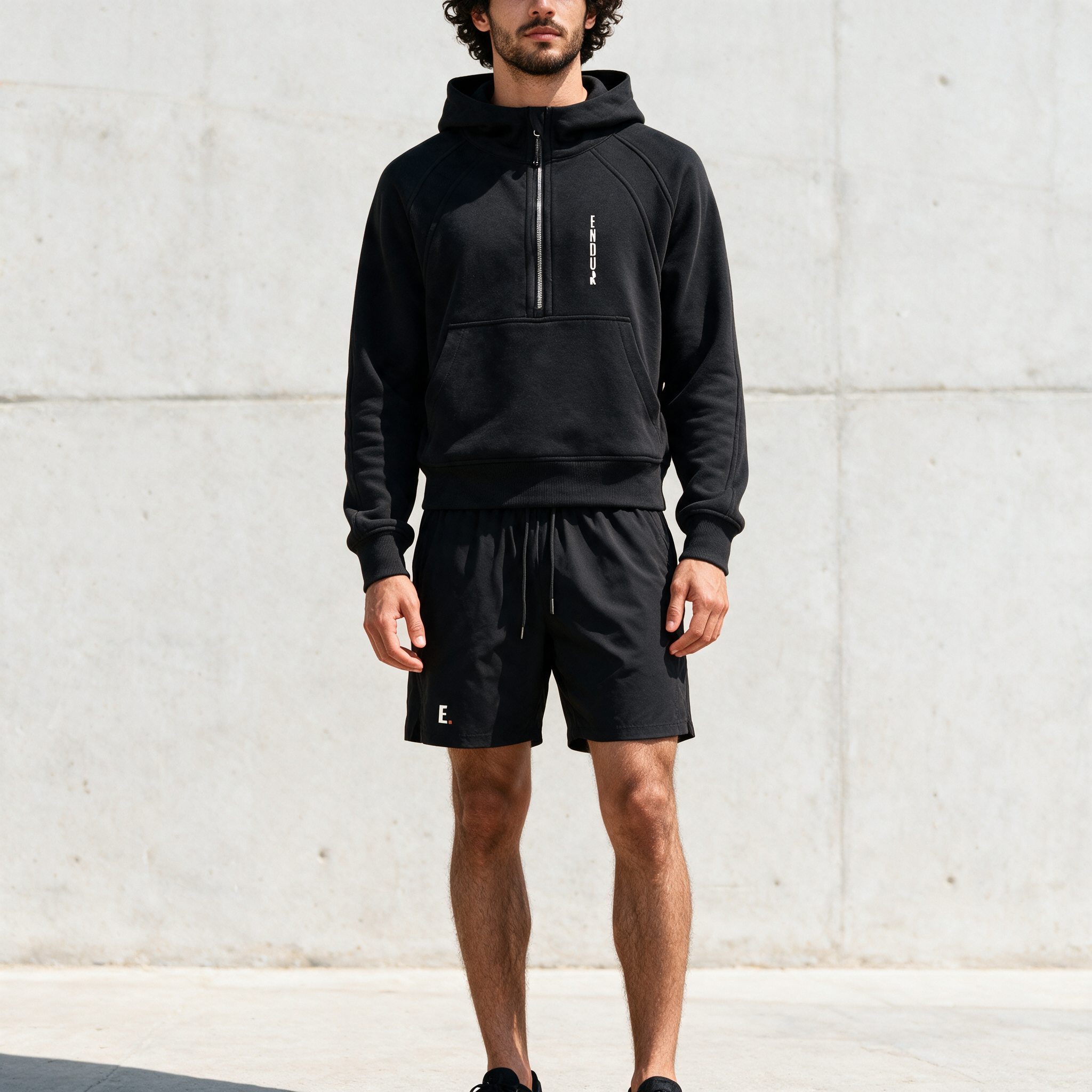 Model wearing the ENDUR Off Day Half-Zip, detail view