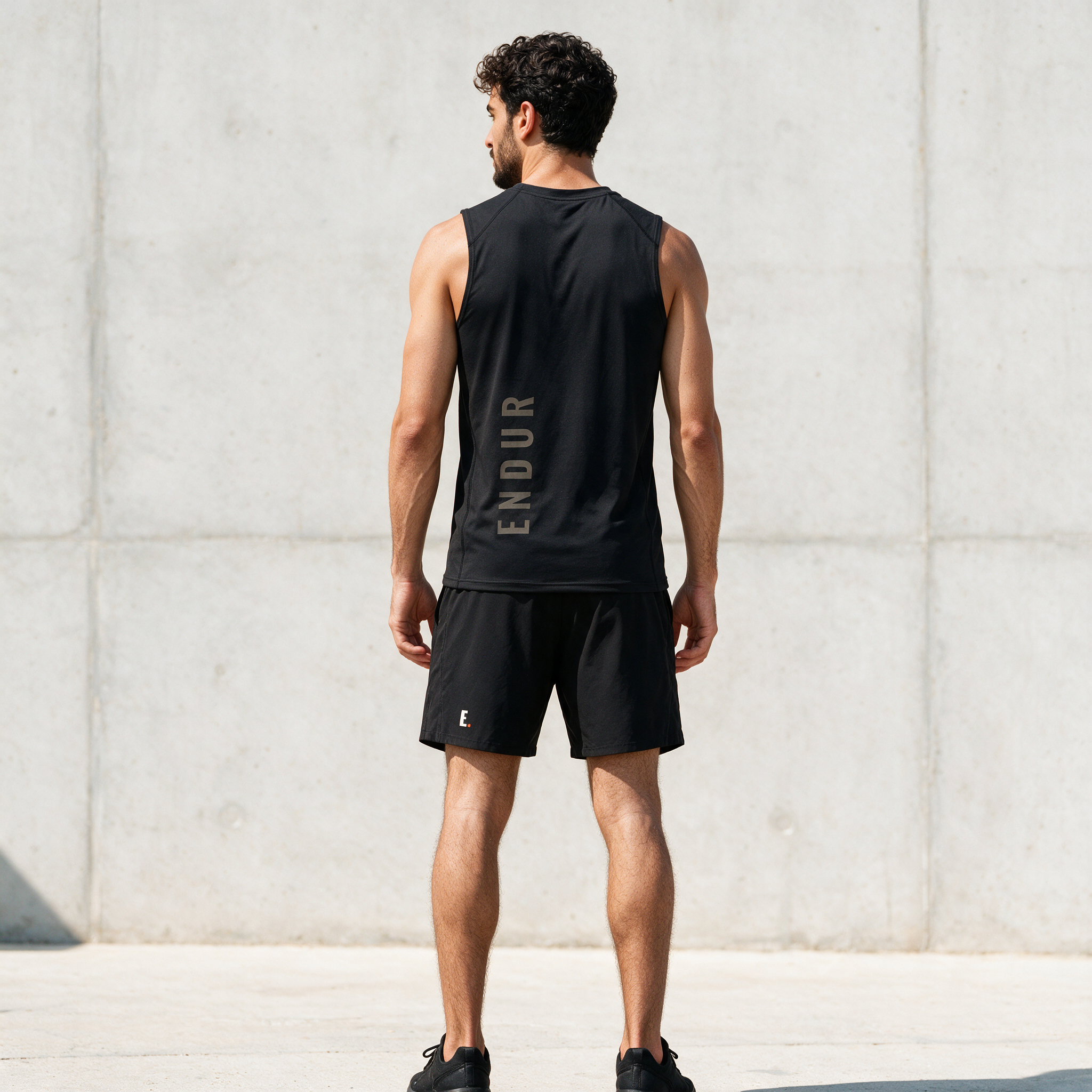 Model wearing the ENDUR Off Day Tank, back view