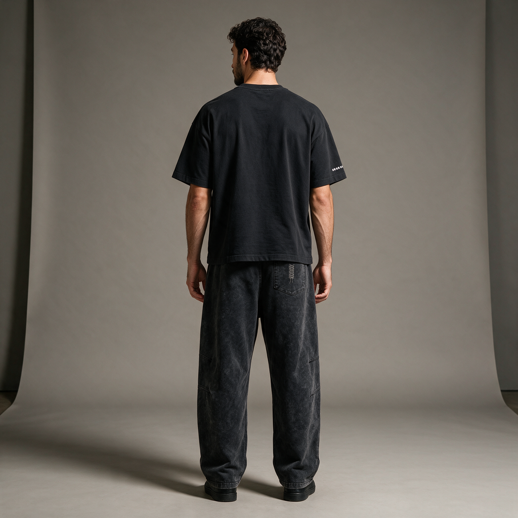 Model wearing the ENDUR Snow Wash Drawstring Pants, studio back view