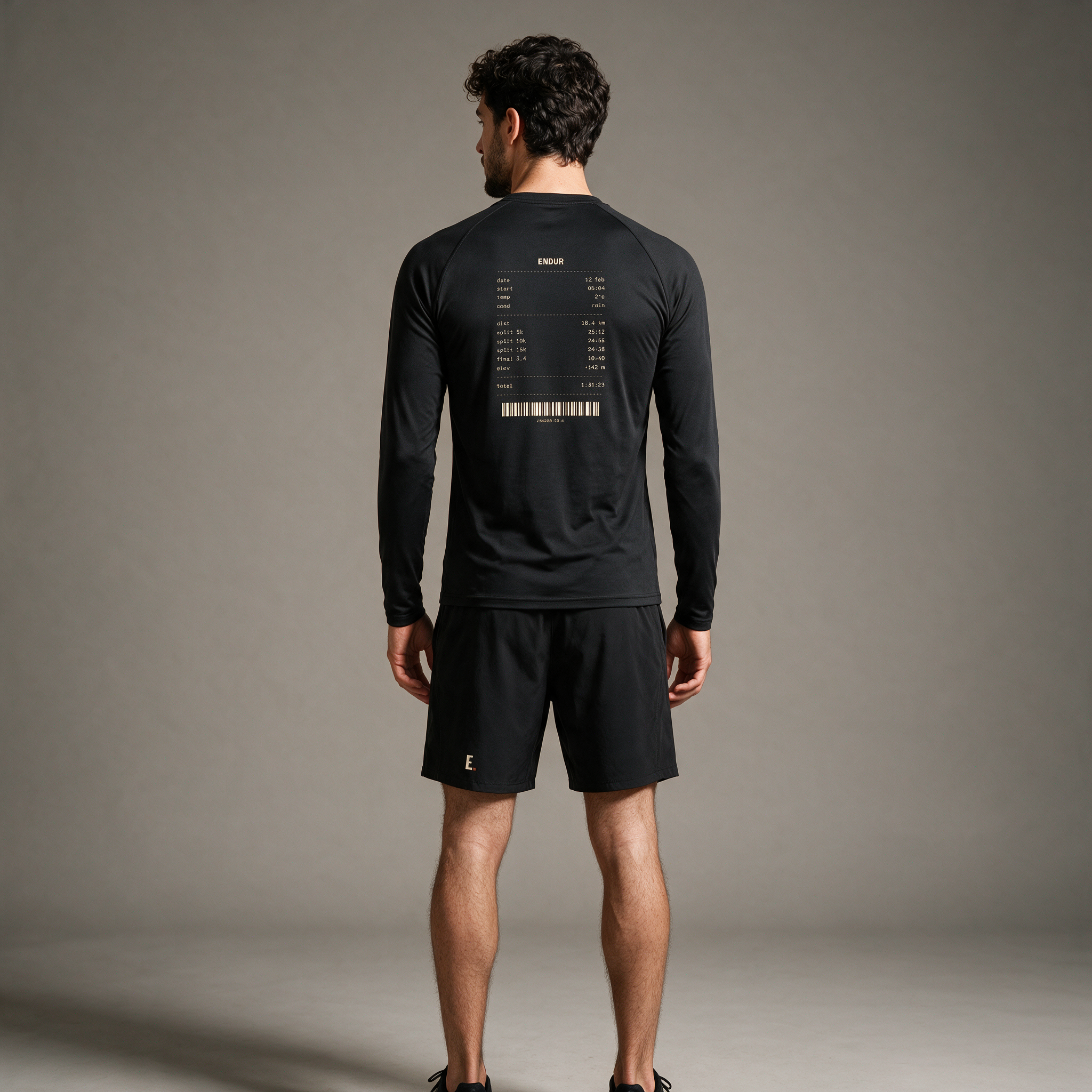 Model wearing the ENDUR Off Day Long Sleeve, studio back view