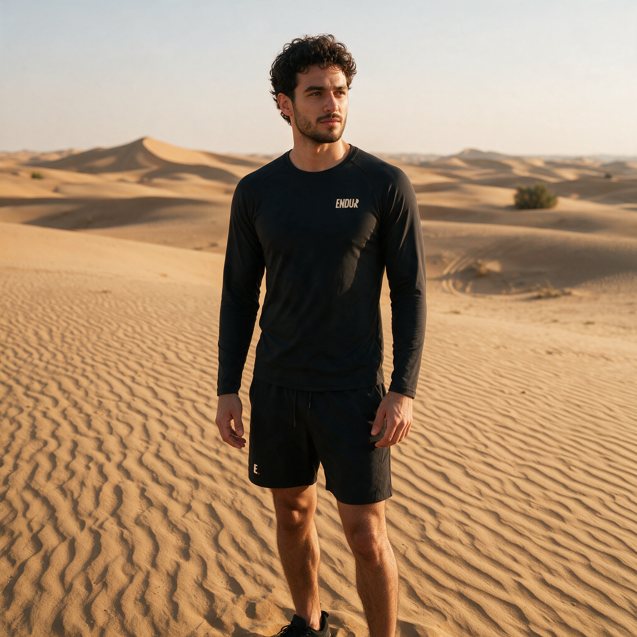 Model wearing the ENDUR Off Day Long Sleeve, in the desert