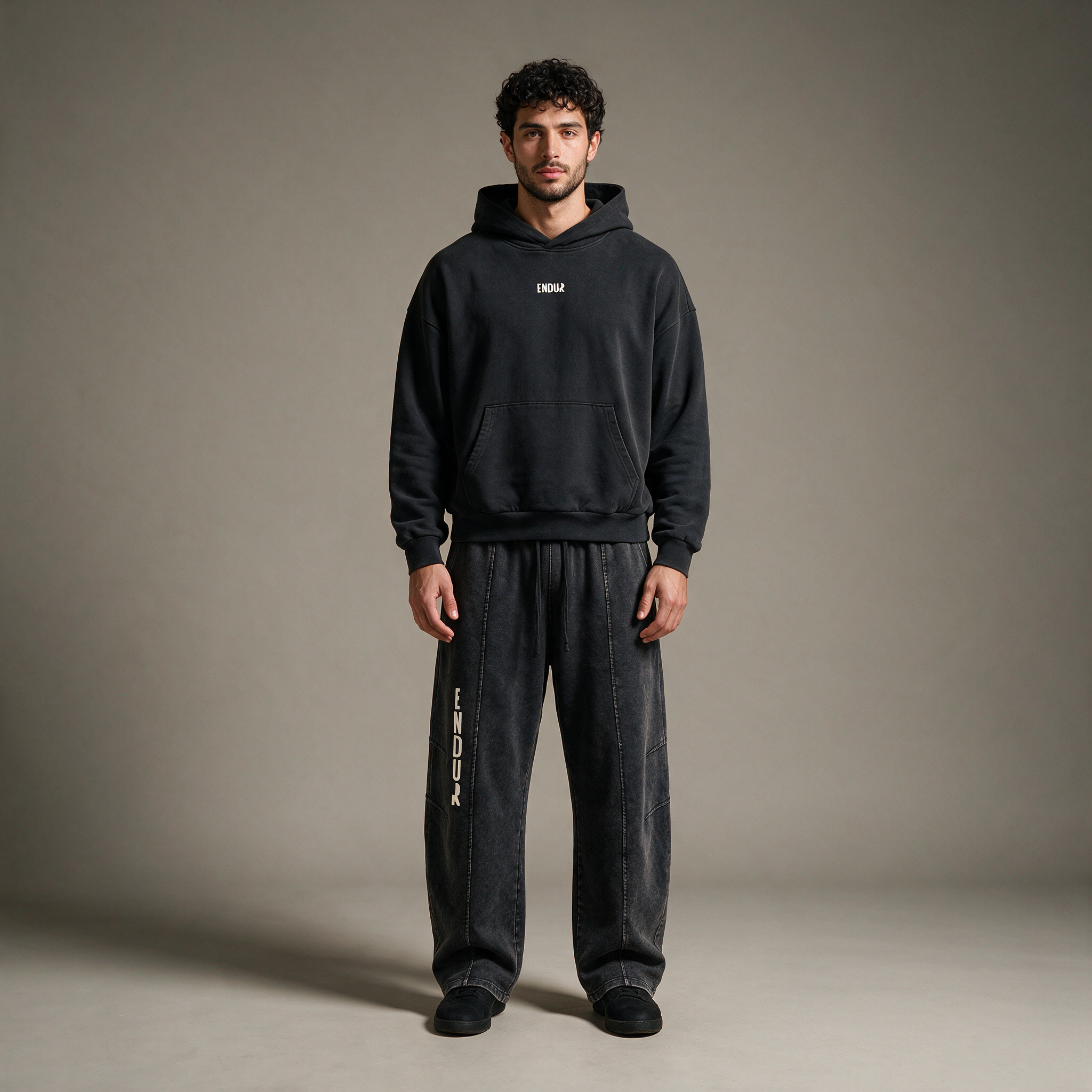 Model wearing the ENDUR Second Lap Set, studio front view