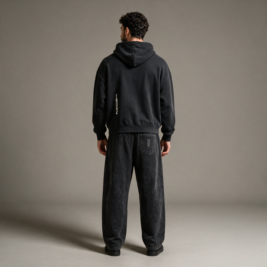 Model wearing the ENDUR Second Lap Set, studio back view