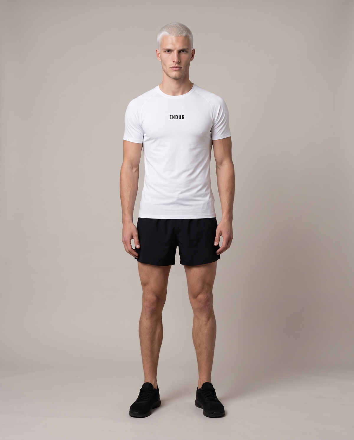 Before The Sun Run Tee — White, front, worn by an ENDUR model