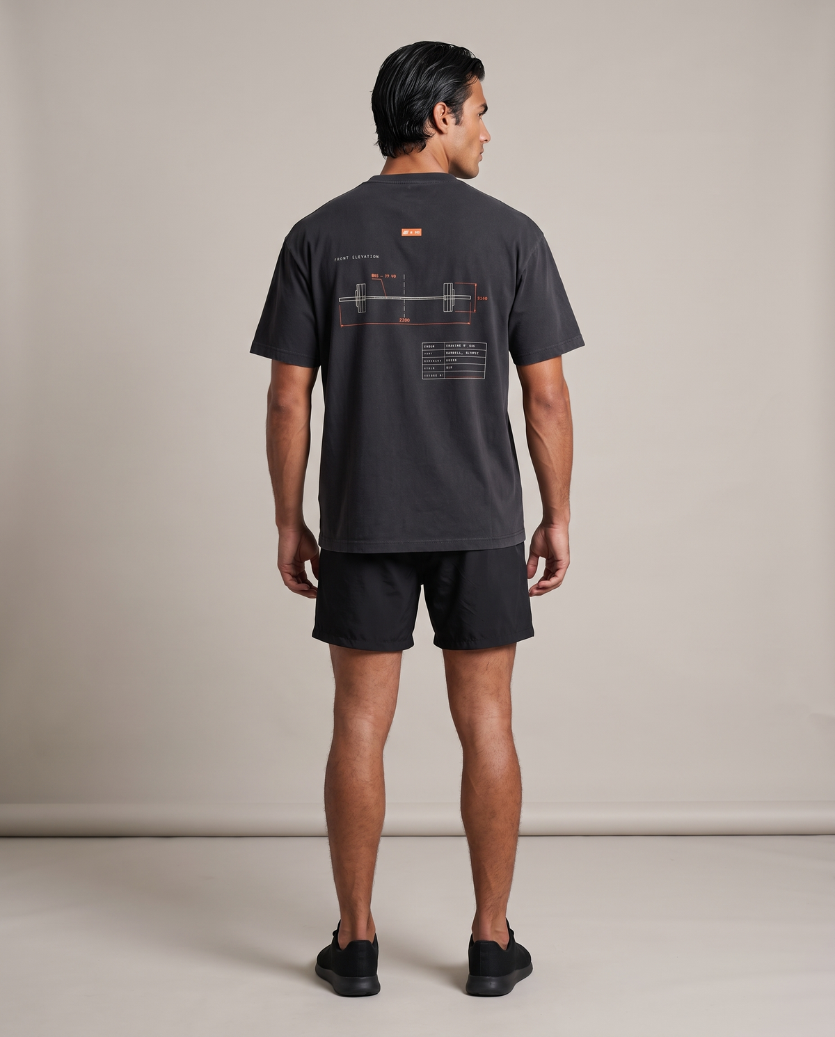 Load Drawing Oversized Tee — Black, back, worn by an ENDUR model
