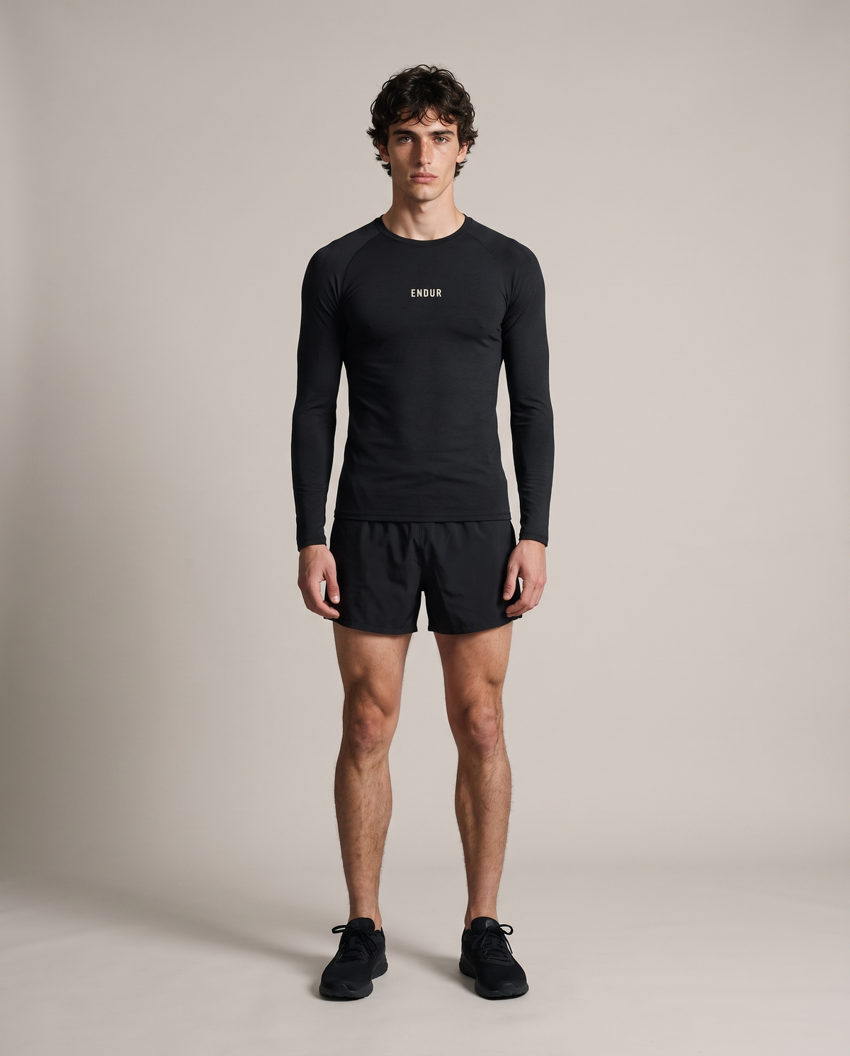 Salt Line Long Sleeve — Black, front, worn by an ENDUR model