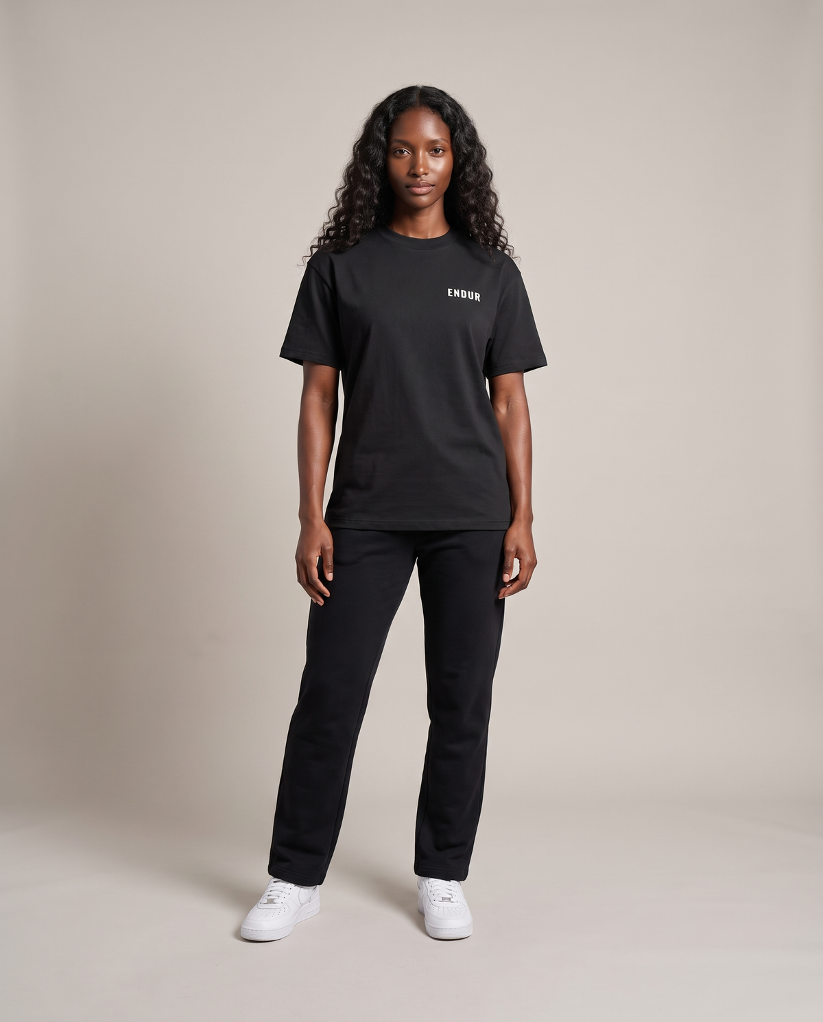 Off Day Protocol Tee — Black, front, worn by an ENDUR model