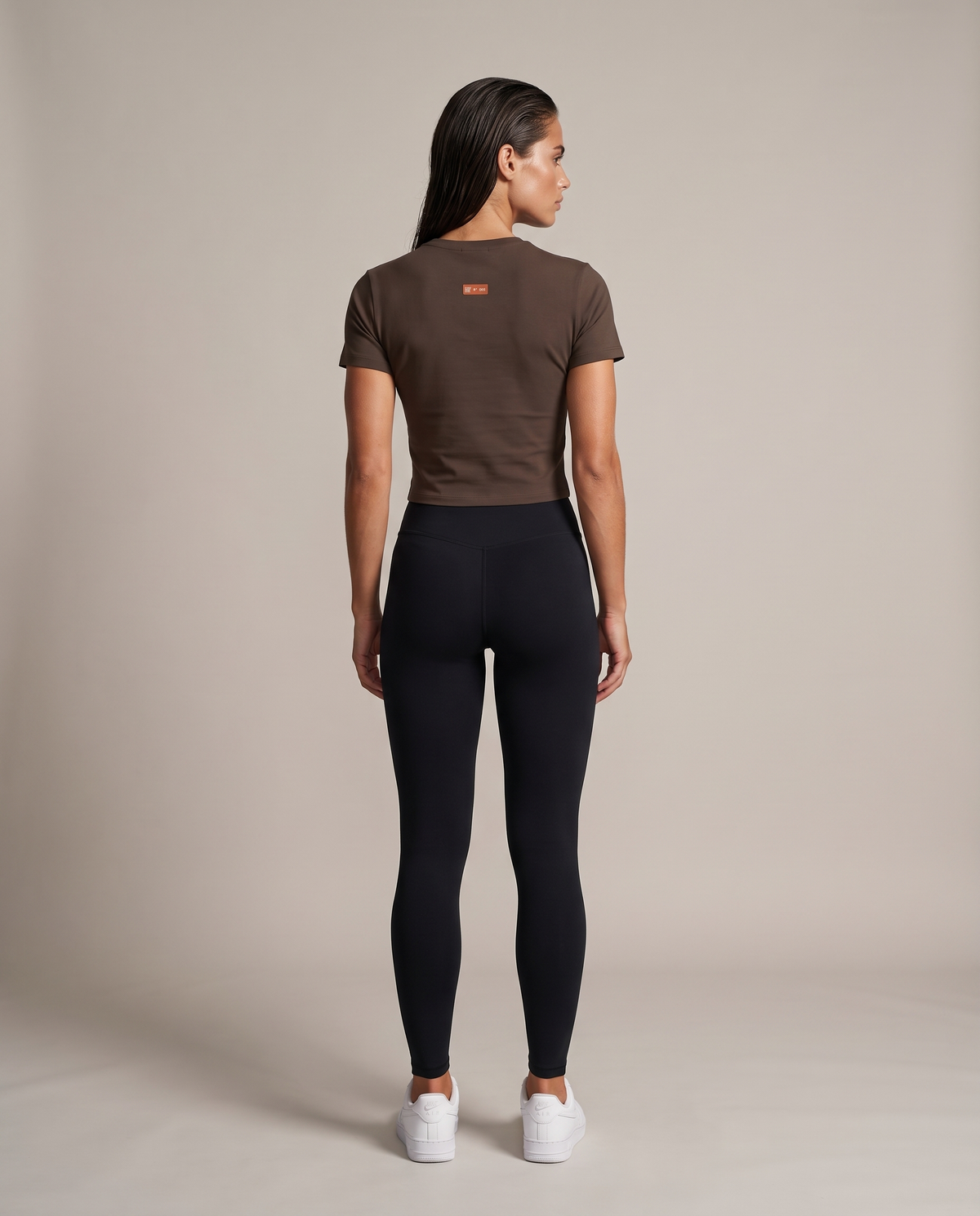 Zone 2 Crop Tee (Women's) — Coffee & Black, back, worn by an ENDUR model